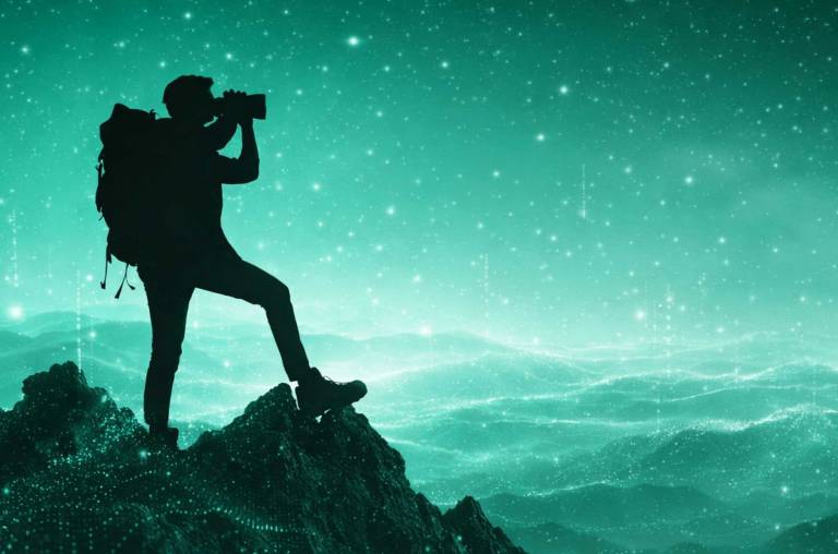 silhouetted figure with binoculars overlooking a stylized digital landscape