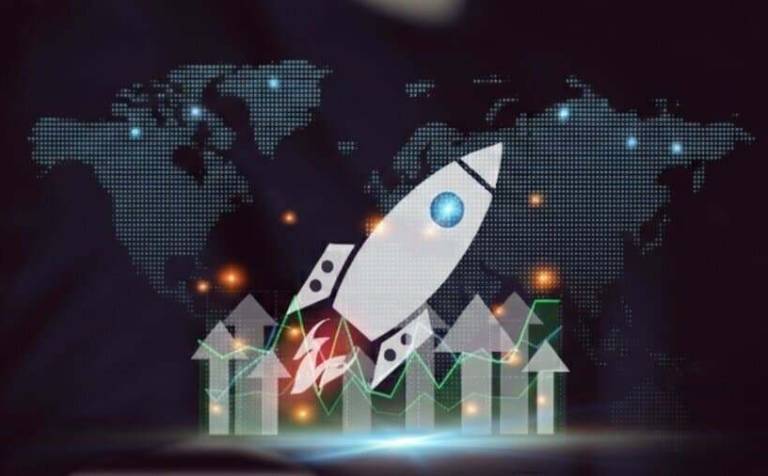 rocket launching upward over rising bar‑style arrows with a digital world map in the background representing global b2b ecommerce growth