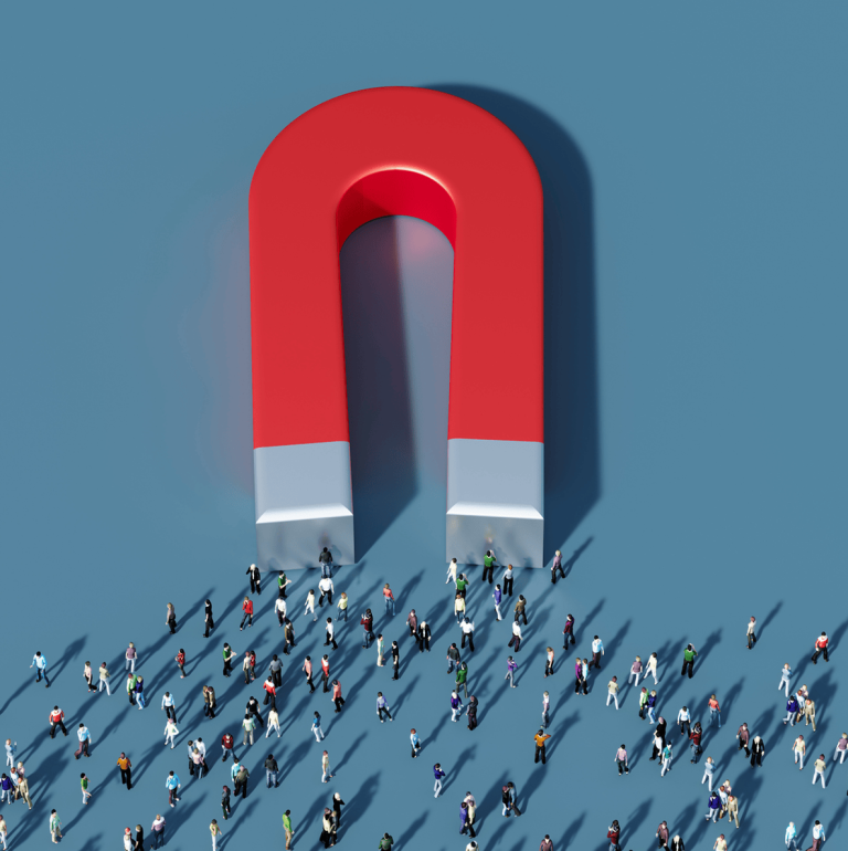 magnet pulling in human figures to represent inbound lead generation