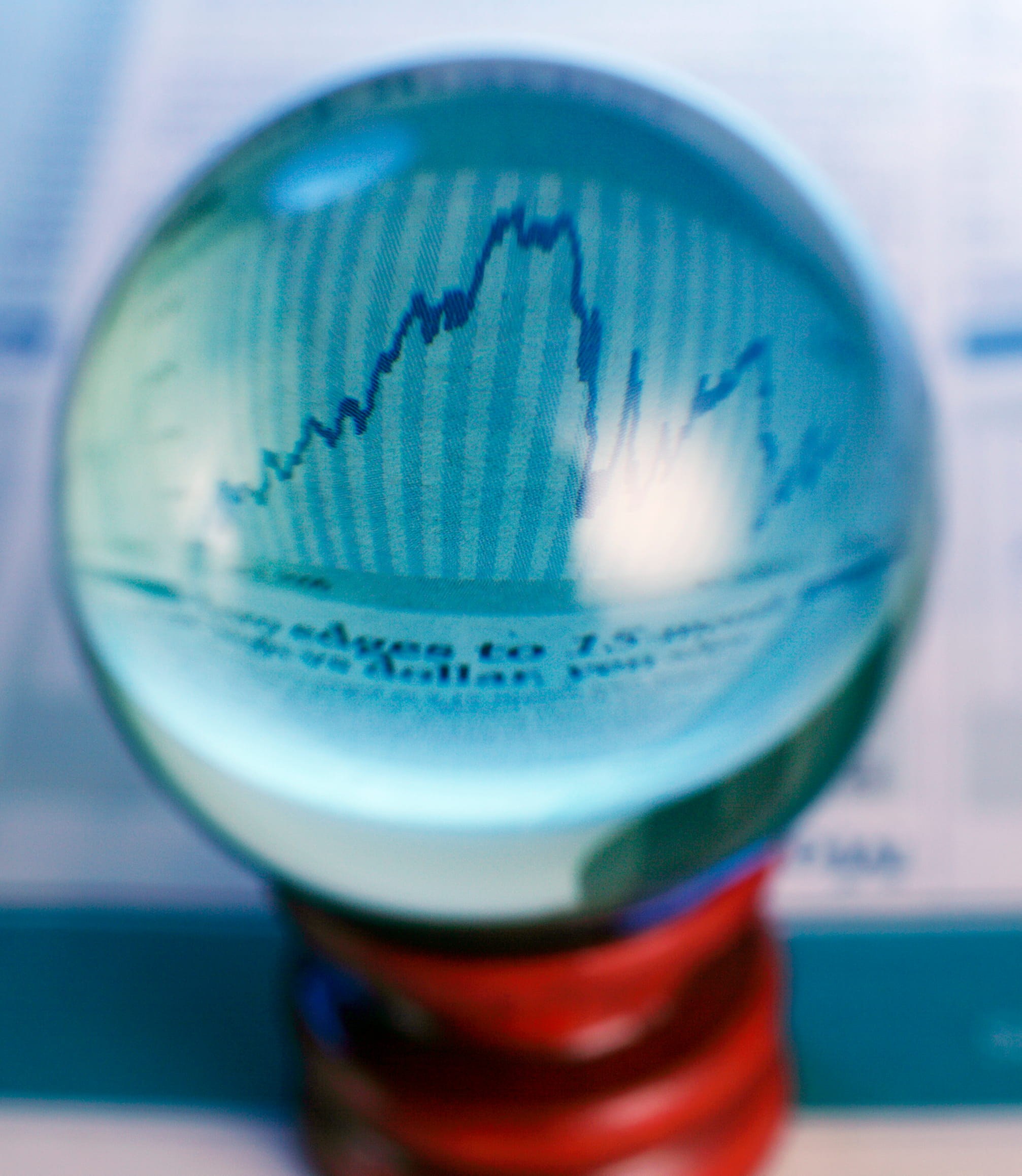 data charts in crystal ball symbolizing predictive analytics that identifies buying intent and triggers timely engagement before prospects formally raise their hand.